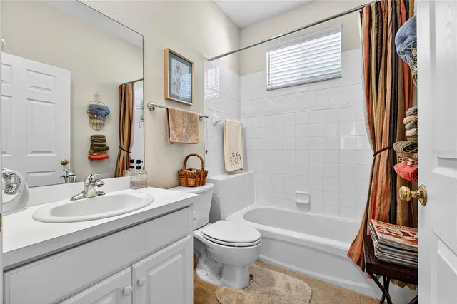 a street view with a garden and signage