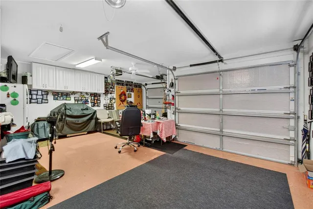 an aerial view of a house with a garden and swimming pool