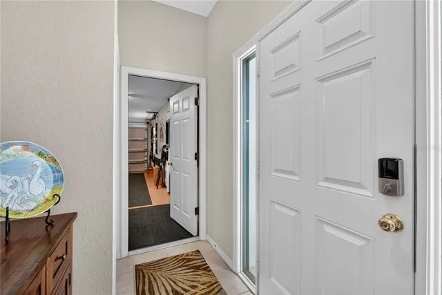 a view of an entryway with wooden floor