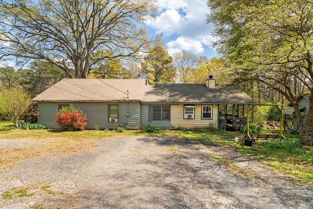 4661 Fowler Street Acworth, GA 30101 - Photo 4 of 23 a front view of a house with a yard