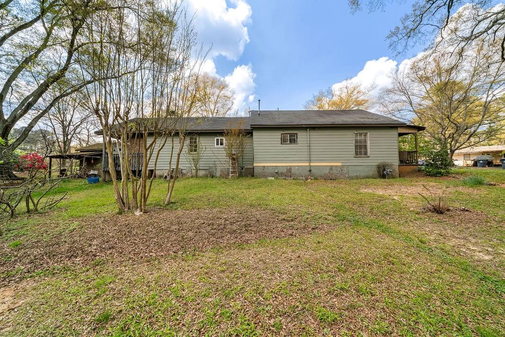 4661 Fowler Street Acworth, GA 30101 - Photo 6 of 23 a house with a garden