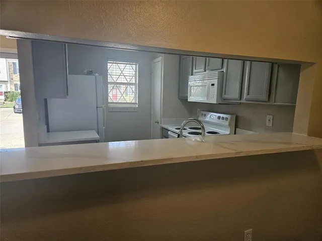 a view of a car park from a windows