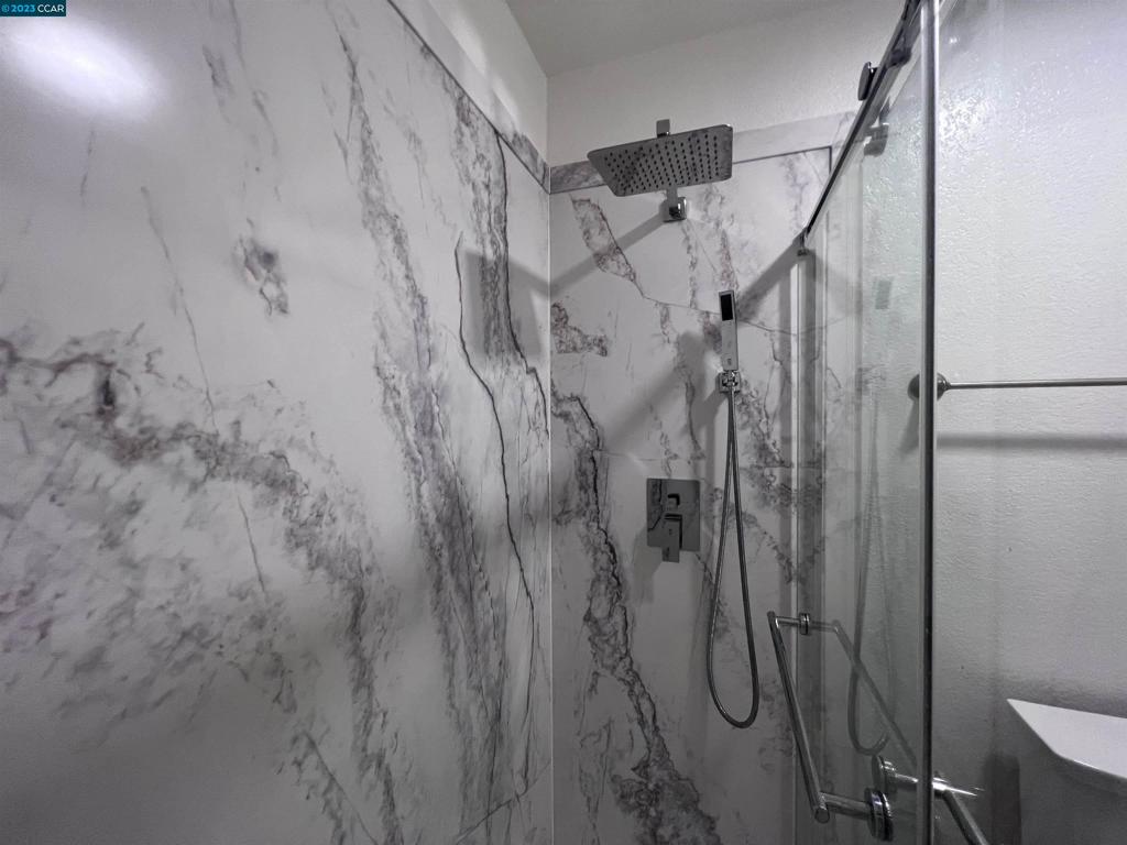 1505 Kirker Pass Road Concord, CA 94521 - Photo 11 of 22 a bathroom with a shower