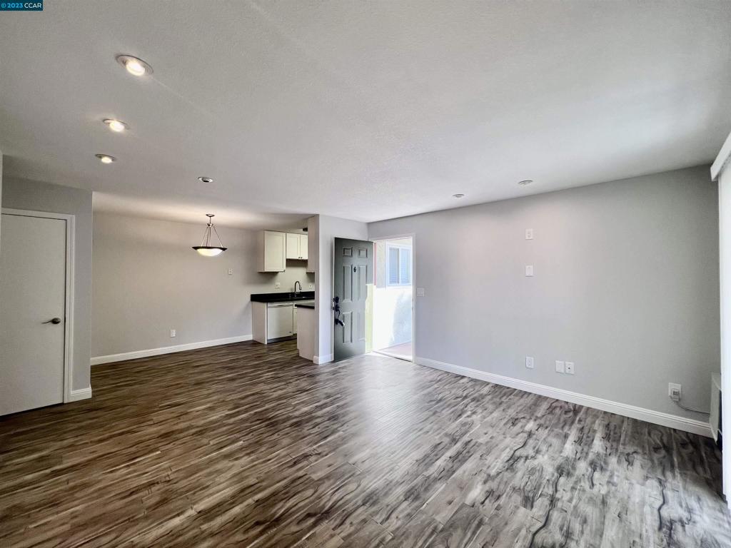 1505 Kirker Pass Road Concord, CA 94521 - Photo 4 of 22 a view of empty room with wooden floor