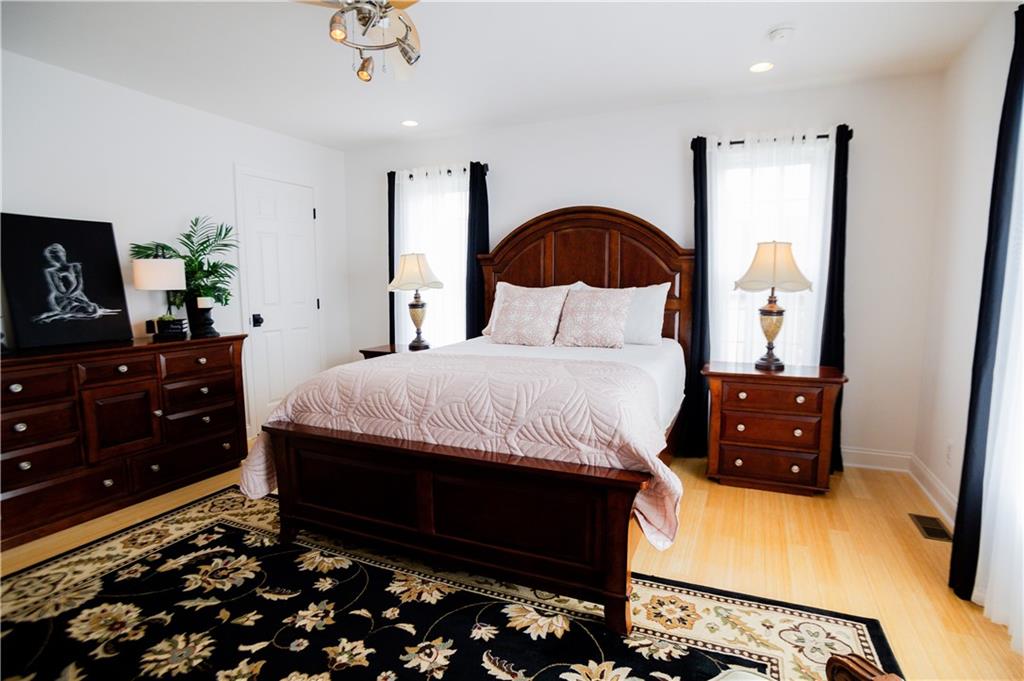 110 Mae Lane Uniontown, PA 15401 - Photo 30 of 41 a bedroom with a bed and a dresser