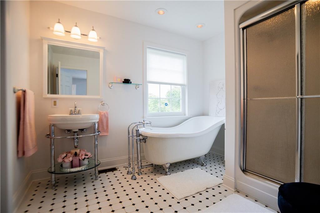 110 Mae Lane Uniontown, PA 15401 - Photo 31 of 41 a bathroom with a sink toilet and shower