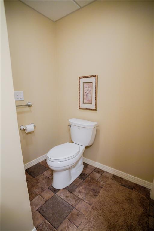 110 Mae Lane Uniontown, PA 15401 - Photo 40 of 41 a white toilet sitting next to a white sink and vanity