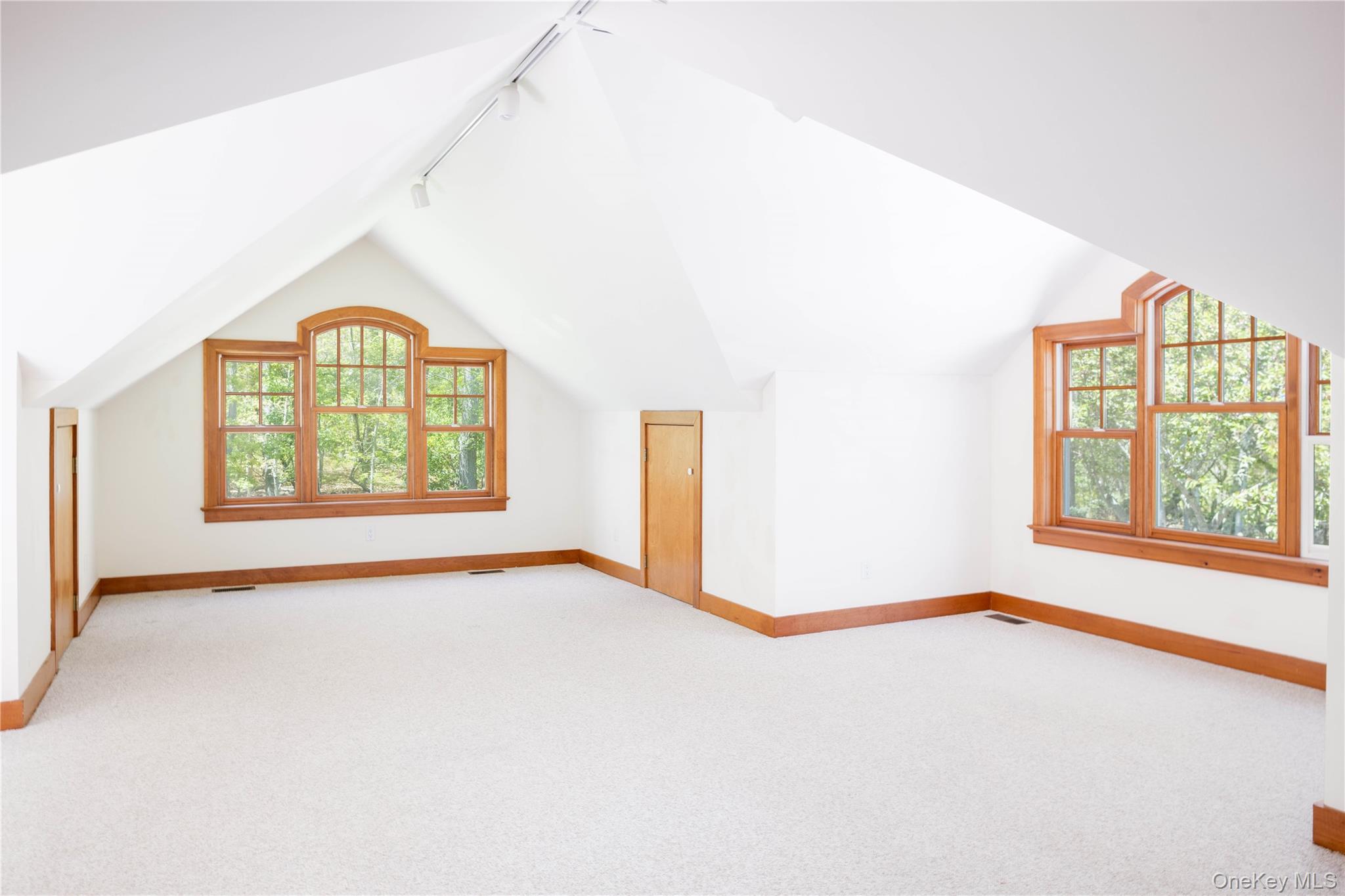 5055 New Suffolk Road New Suffolk, NY 11956 - Photo 29 of 42 an empty room with windows