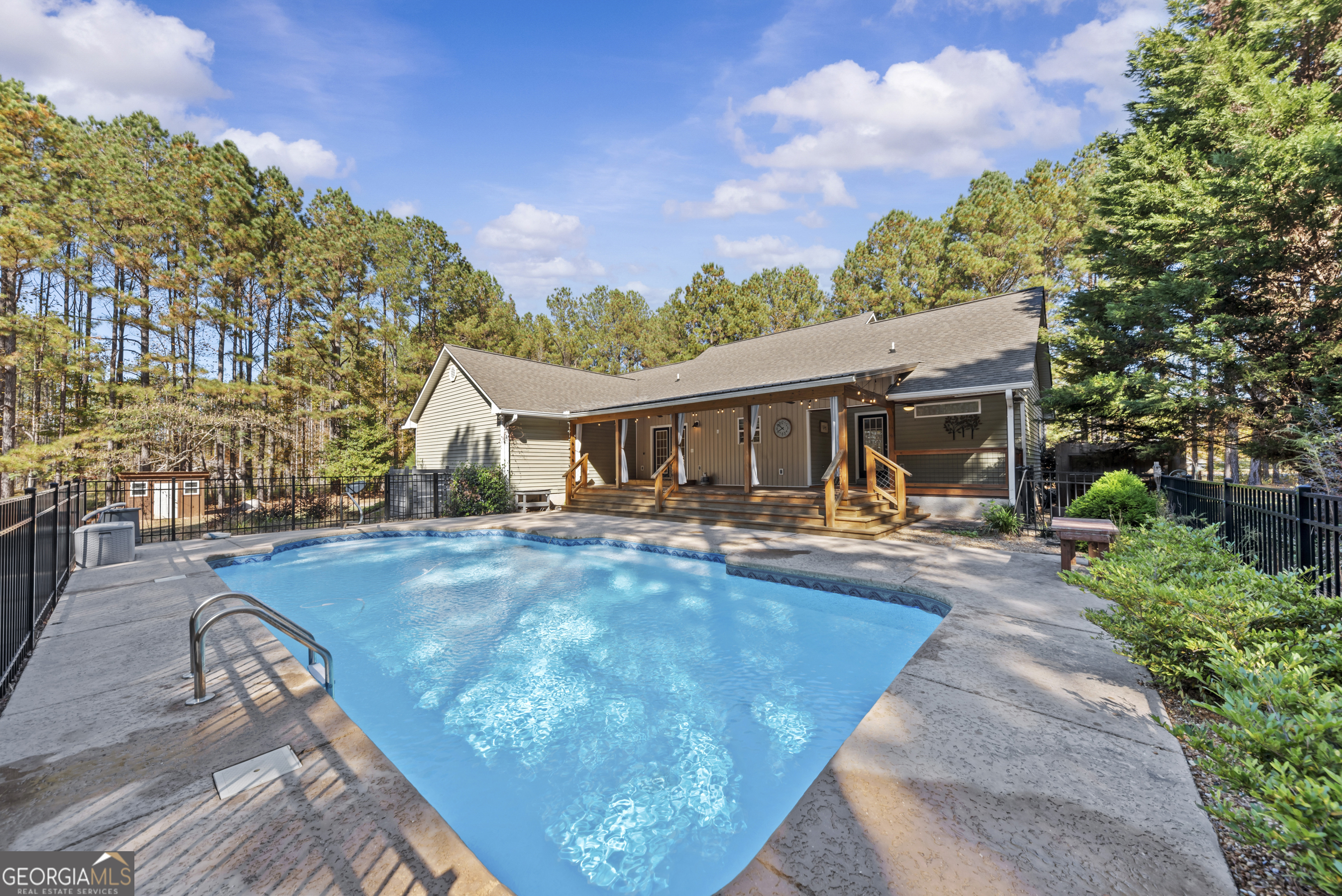 384 Scuffleboro Road Southeast Eatonton, GA 31024 - Photo 40 of 48 a front view of house with yard and outdoor seating
