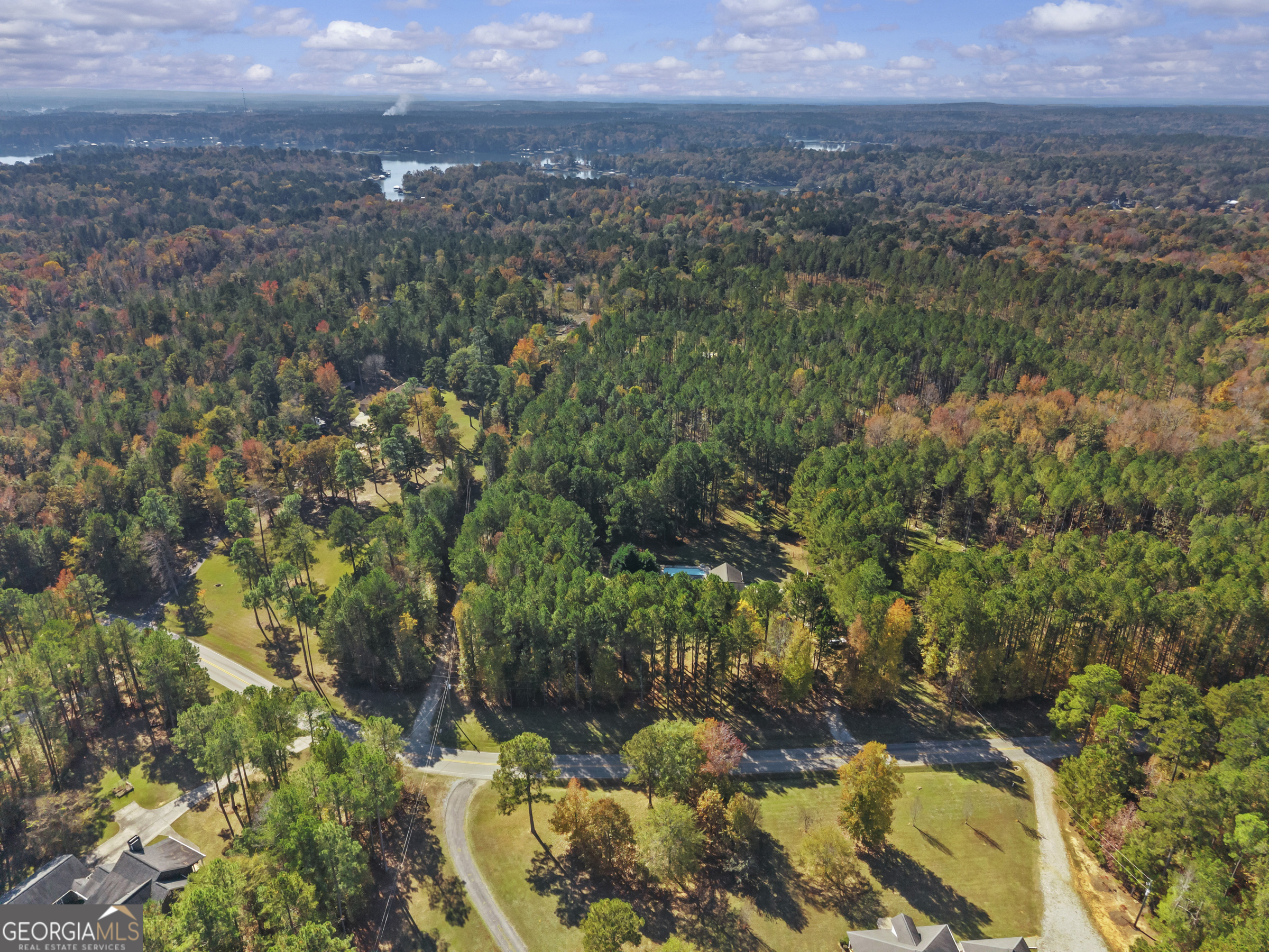 384 Scuffleboro Road Southeast Eatonton, GA 31024 - Photo 48 of 48 a view of a lake and mountain