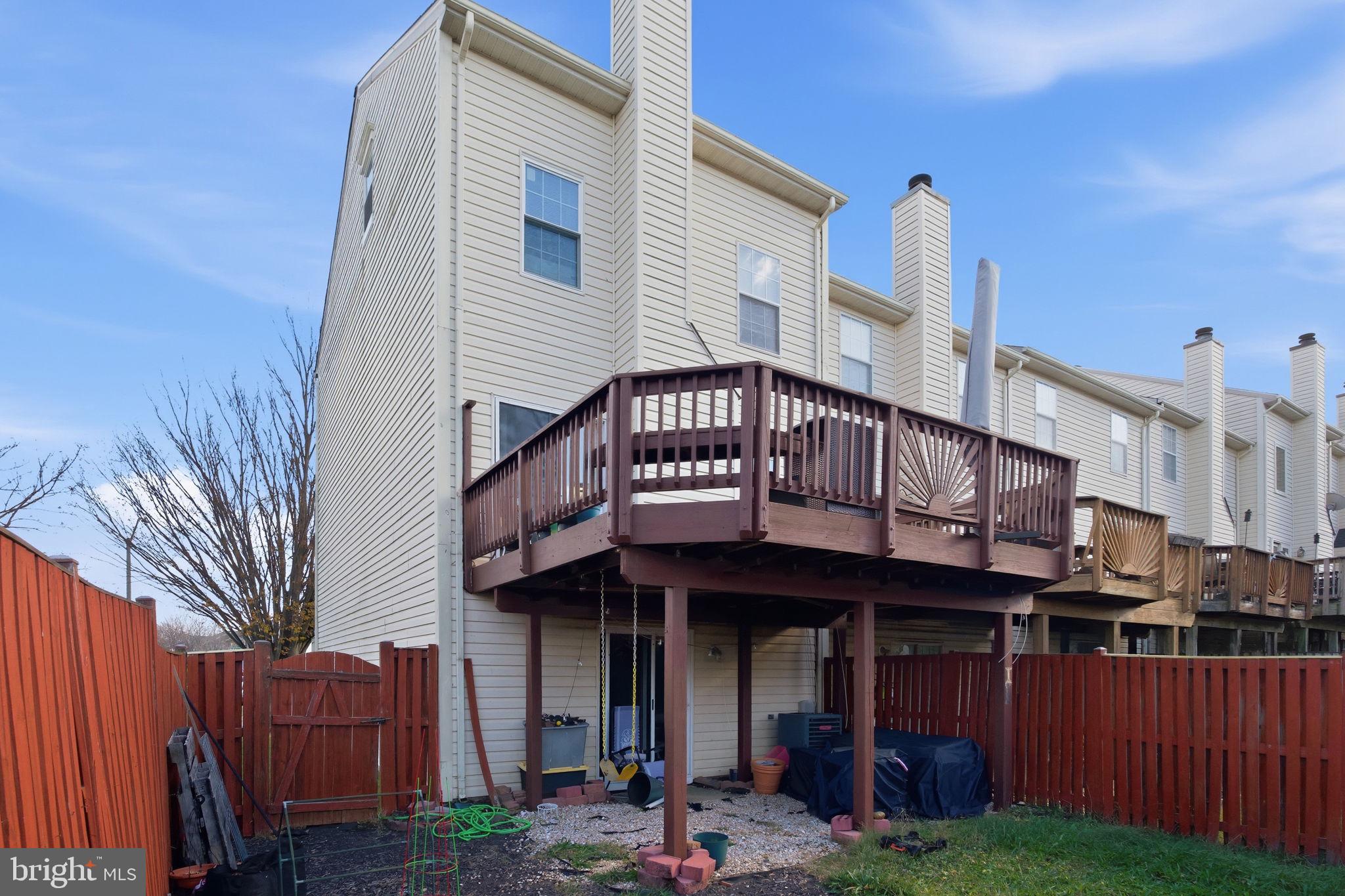9300 Ridings Way Laurel, MD 20723 - Photo 20 of 24 a front view of a house with garden