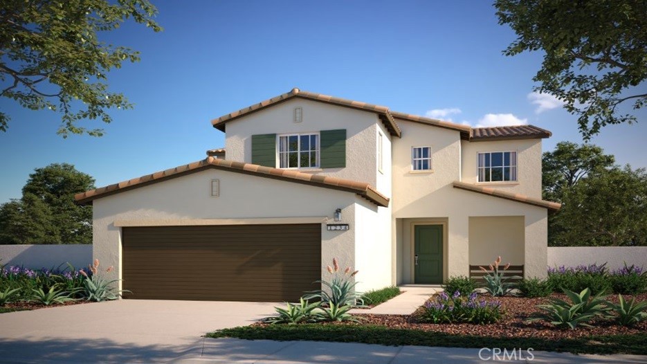 36962 Corvina Way Beaumont, CA 92223 - Photo 1 of 12 a front view of a house with a yard and garage