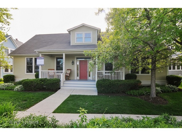 1040 Harris Road Grayslake, IL 60030 - Photo 1 of 24 a front view of a house with a yard
