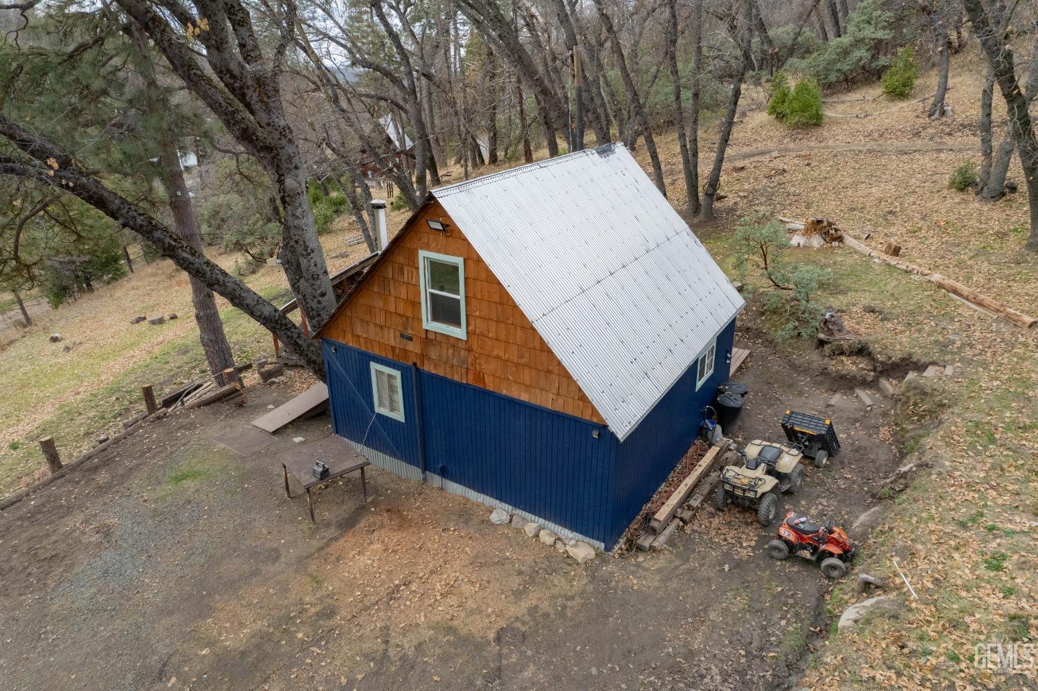 Undisclosed Address Posey, CA 93260 - Photo 12 of 51 an outdoor space with wooden fence and trees