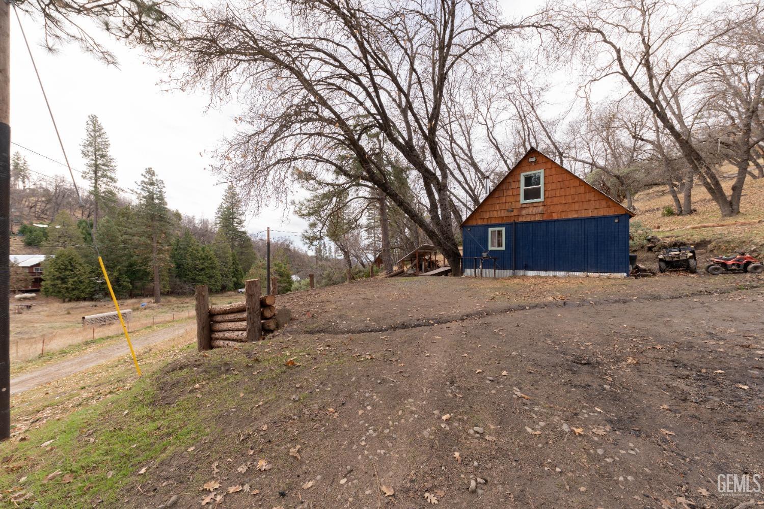 Undisclosed Address Posey, CA 93260 - Photo 15 of 51 a view of house covered with snow in outdoor space
