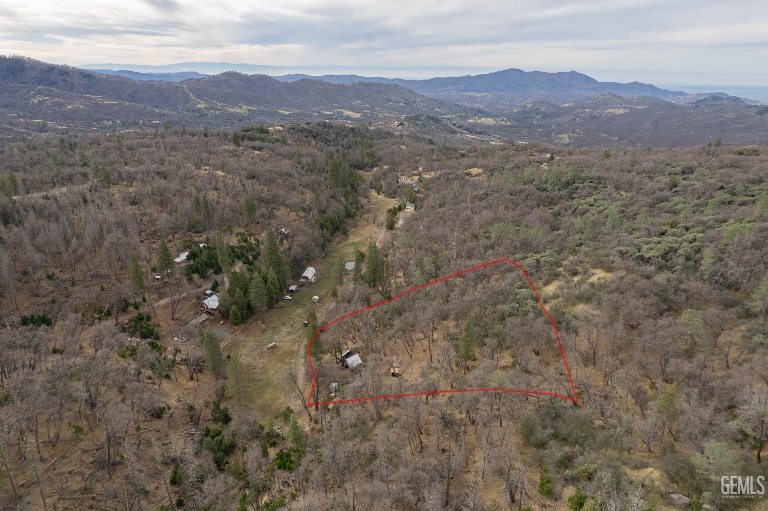 Undisclosed Address Posey, CA 93260 - Photo 9 of 51 a view of a lush green hillside and a houses