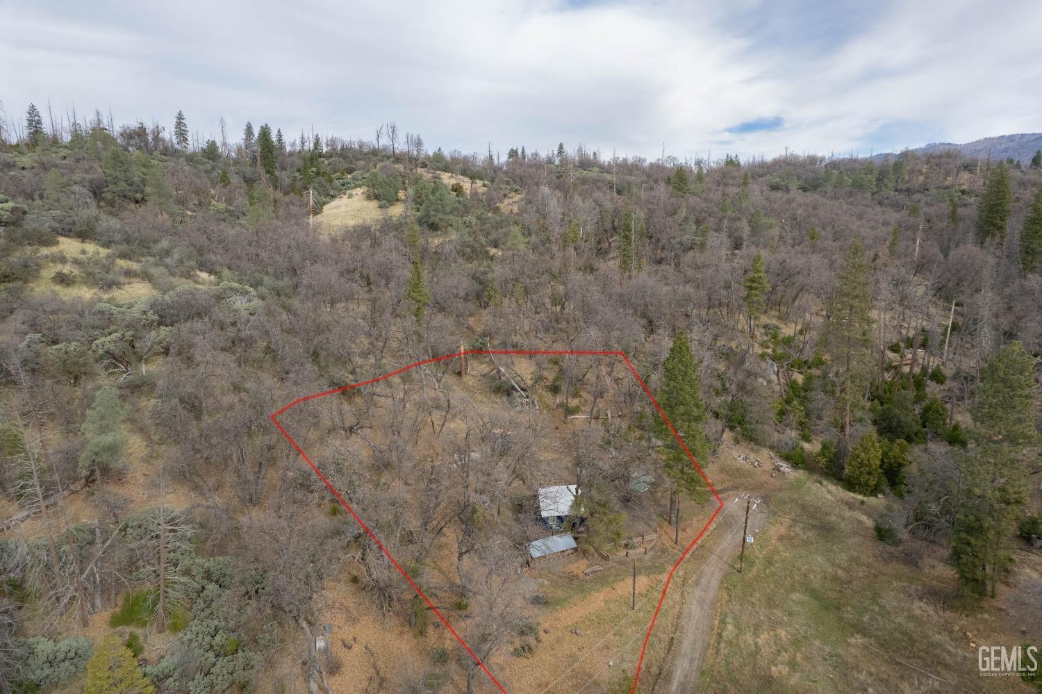 Undisclosed Address Posey, CA 93260 - Photo 10 of 51 a view of a city with lush green forest