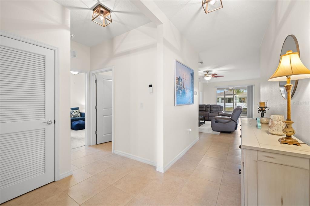 13562 Paddington Way Spring Hill, FL 34609 - Photo 2 of 39 a view of a living room and a bathroom