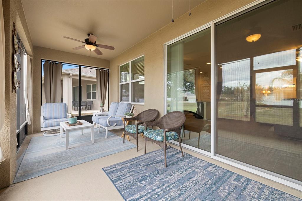 13562 Paddington Way Spring Hill, FL 34609 - Photo 31 of 39 a living room with furniture and a large window