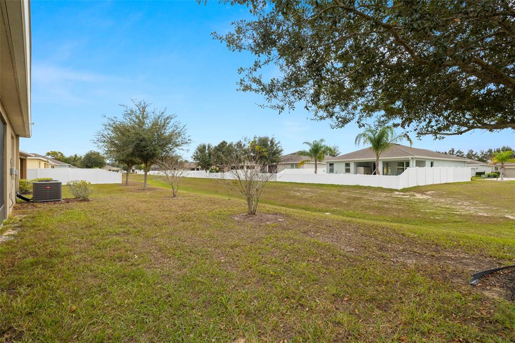 13562 Paddington Way Spring Hill, FL 34609 - Photo 33 of 39 a swimming pool with an outdoor space