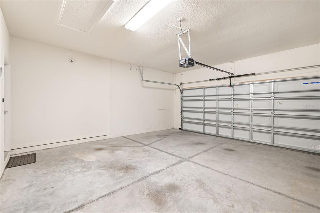 13562 Paddington Way Spring Hill, FL 34609 - Photo 35 of 39 a view of a garage