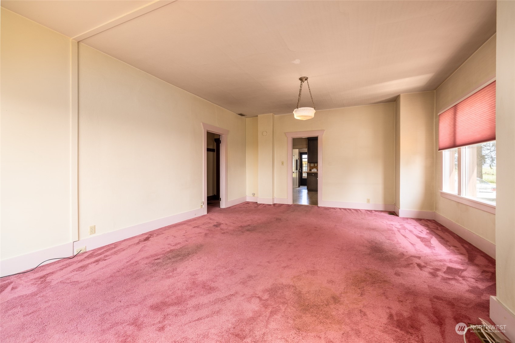 17601 Peterson Road Burlington, WA 98233 - Photo 4 of 36 a view of an empty room with window and wooden floor