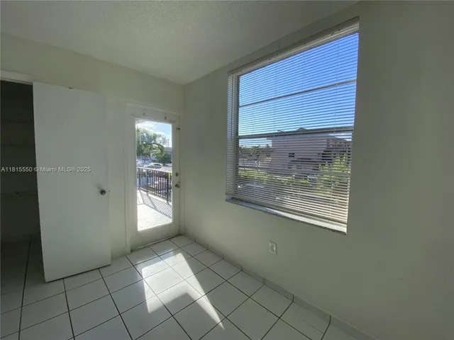 a view of an empty room with window
