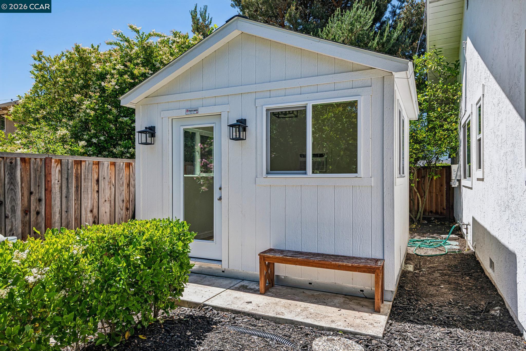 2941 Roundhill Road Alamo, CA 94507 - Photo 79 of 83 a front view of a house with garden