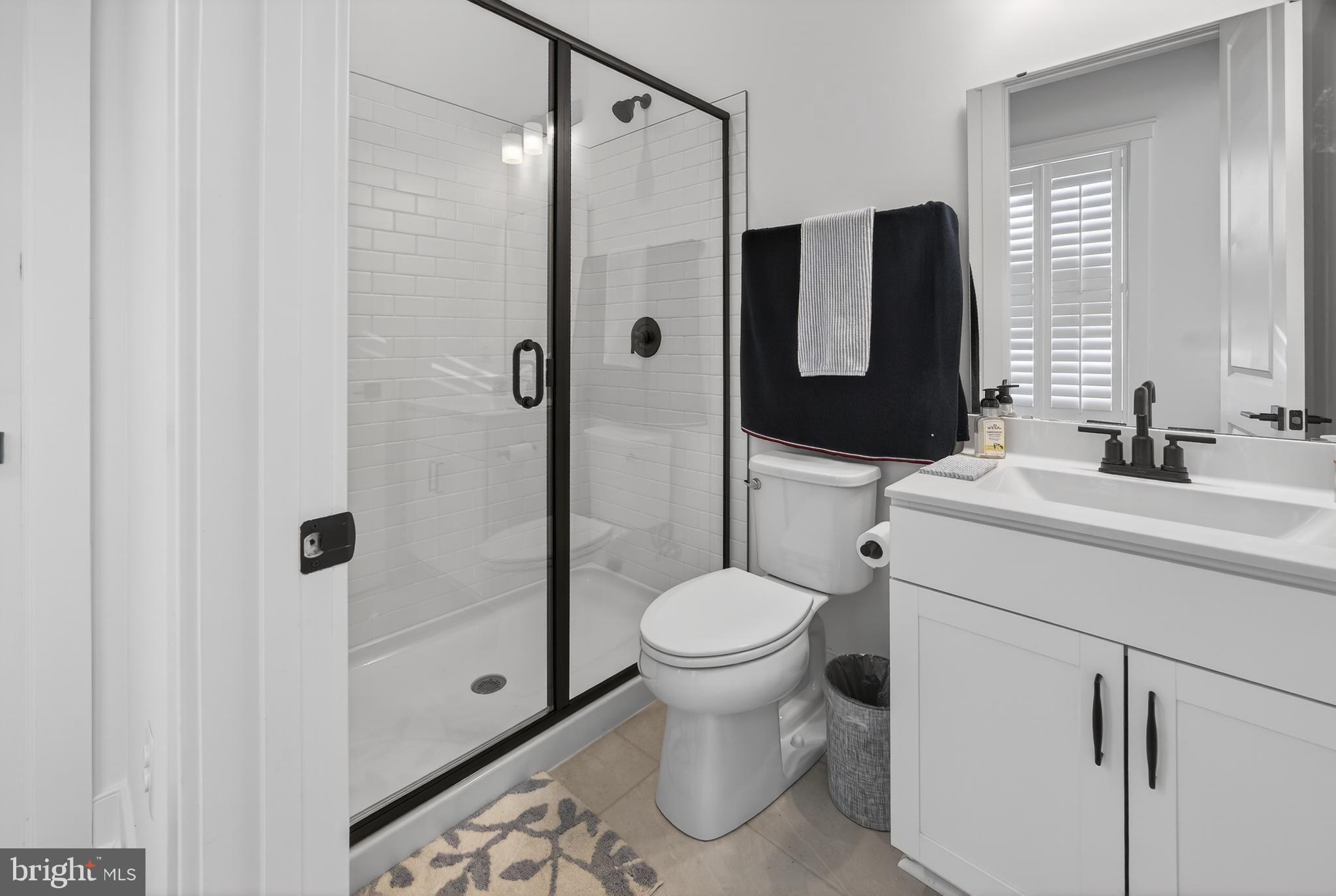 528 Warbler Way Chester, MD 21619 - Photo 19 of 29 a bathroom with a sink toilet and shower
