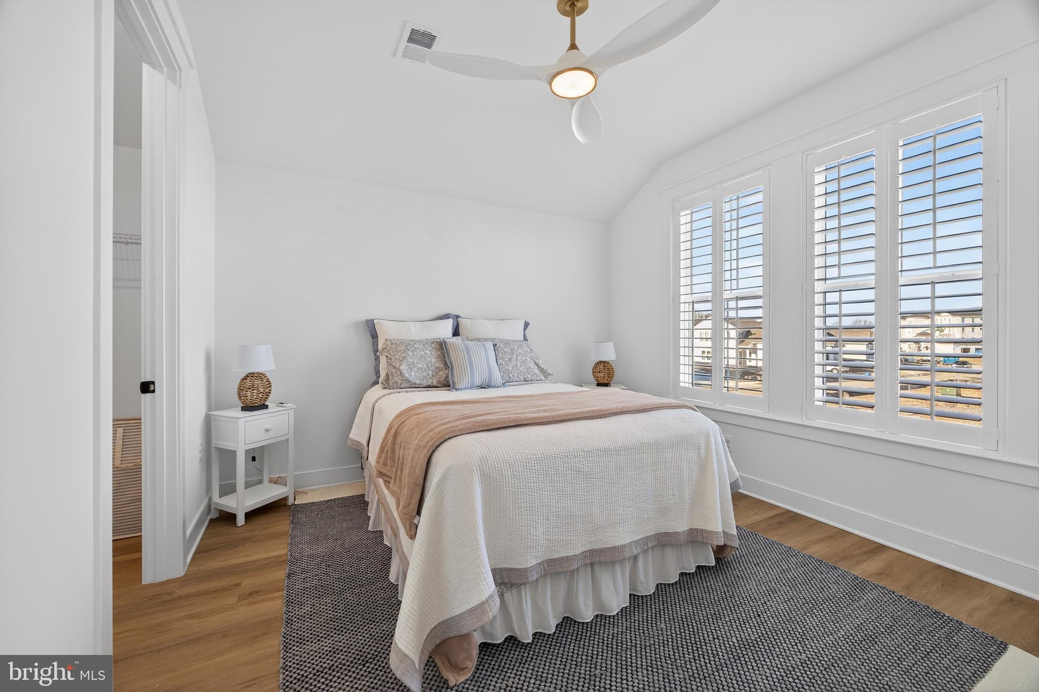 528 Warbler Way Chester, MD 21619 - Photo 23 of 29 a bedroom with a bed and a window
