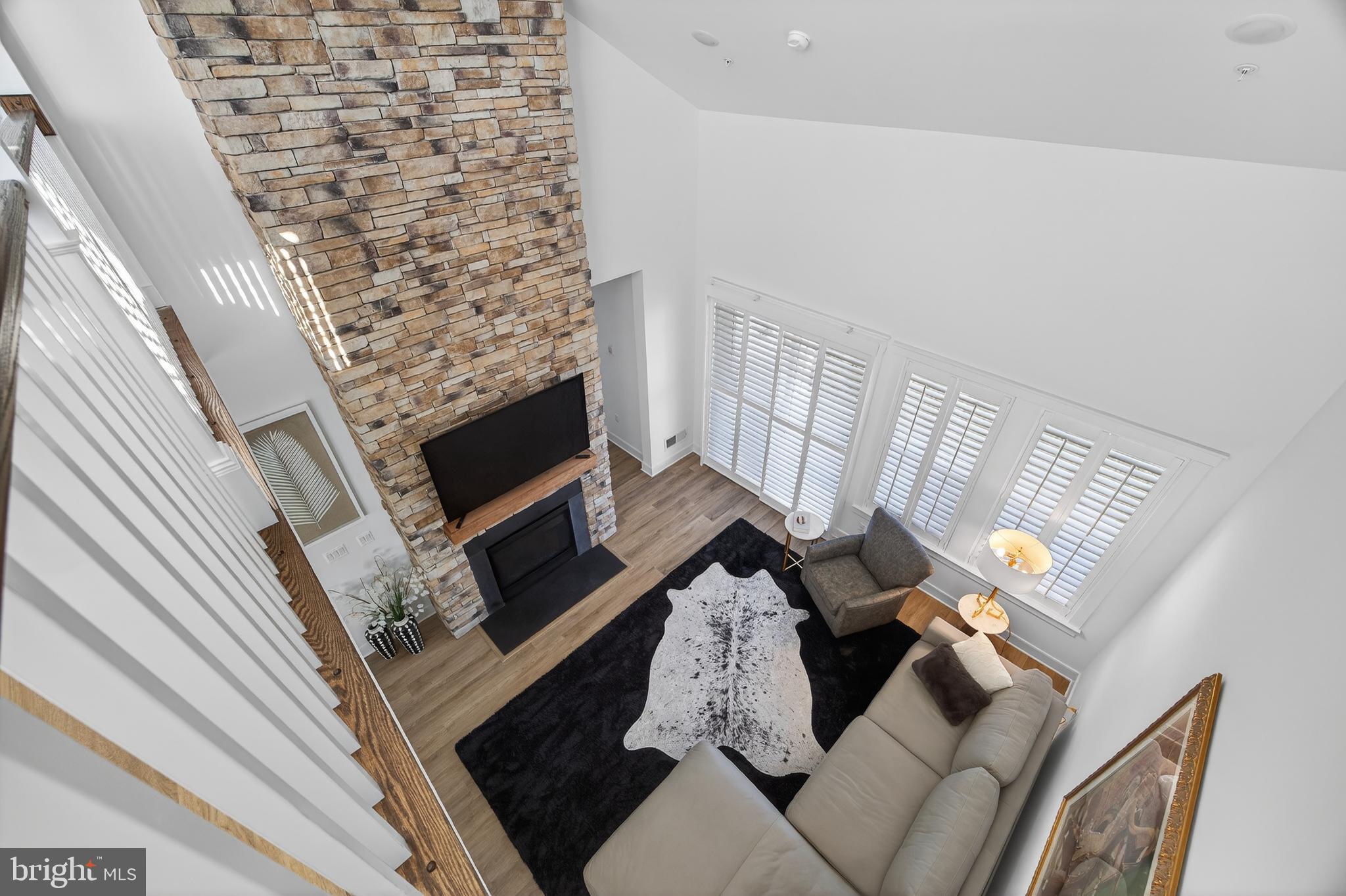 528 Warbler Way Chester, MD 21619 - Photo 25 of 29 a living room with furniture and a fireplace