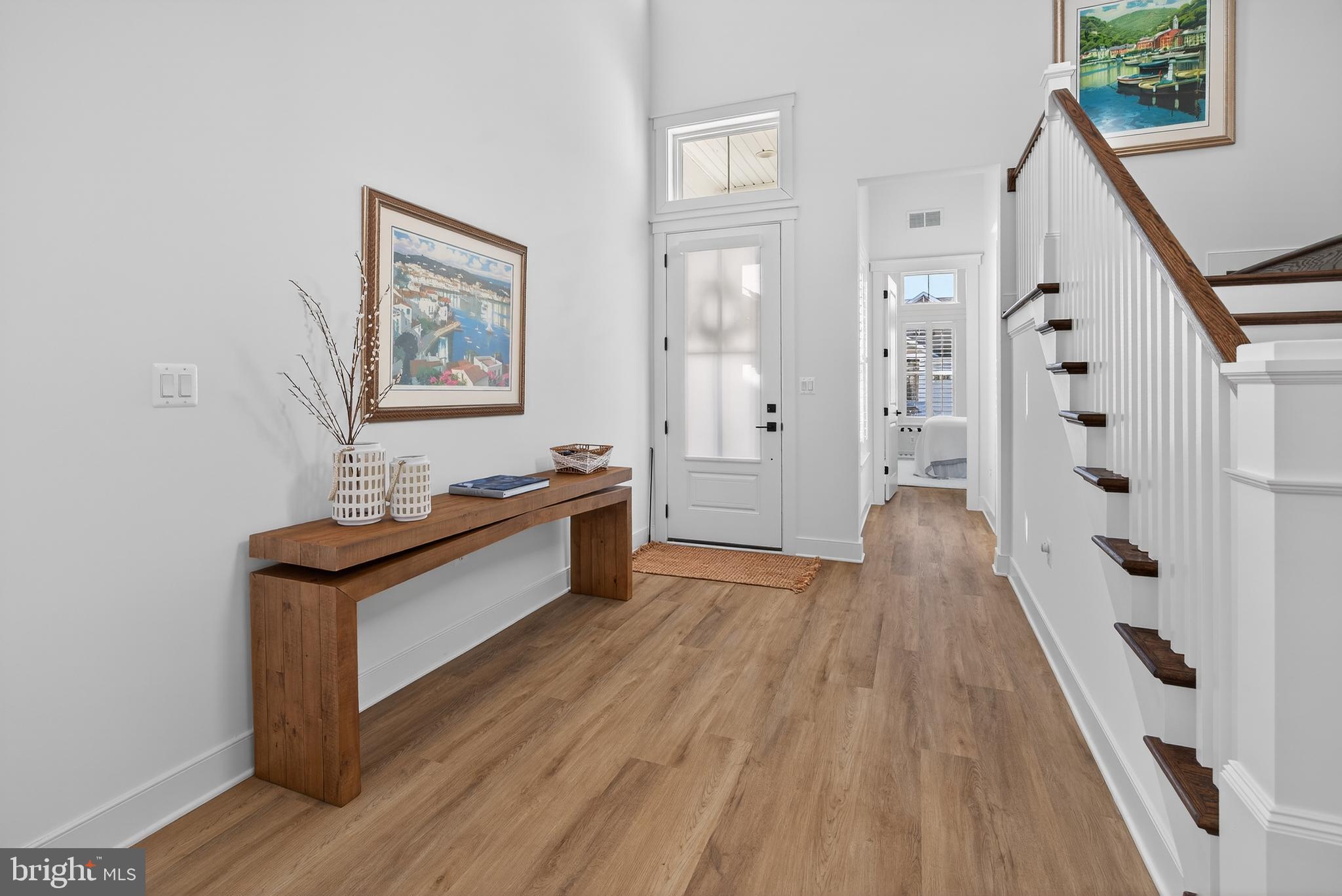 528 Warbler Way Chester, MD 21619 - Photo 3 of 29 workspace with wooden floor and furniture