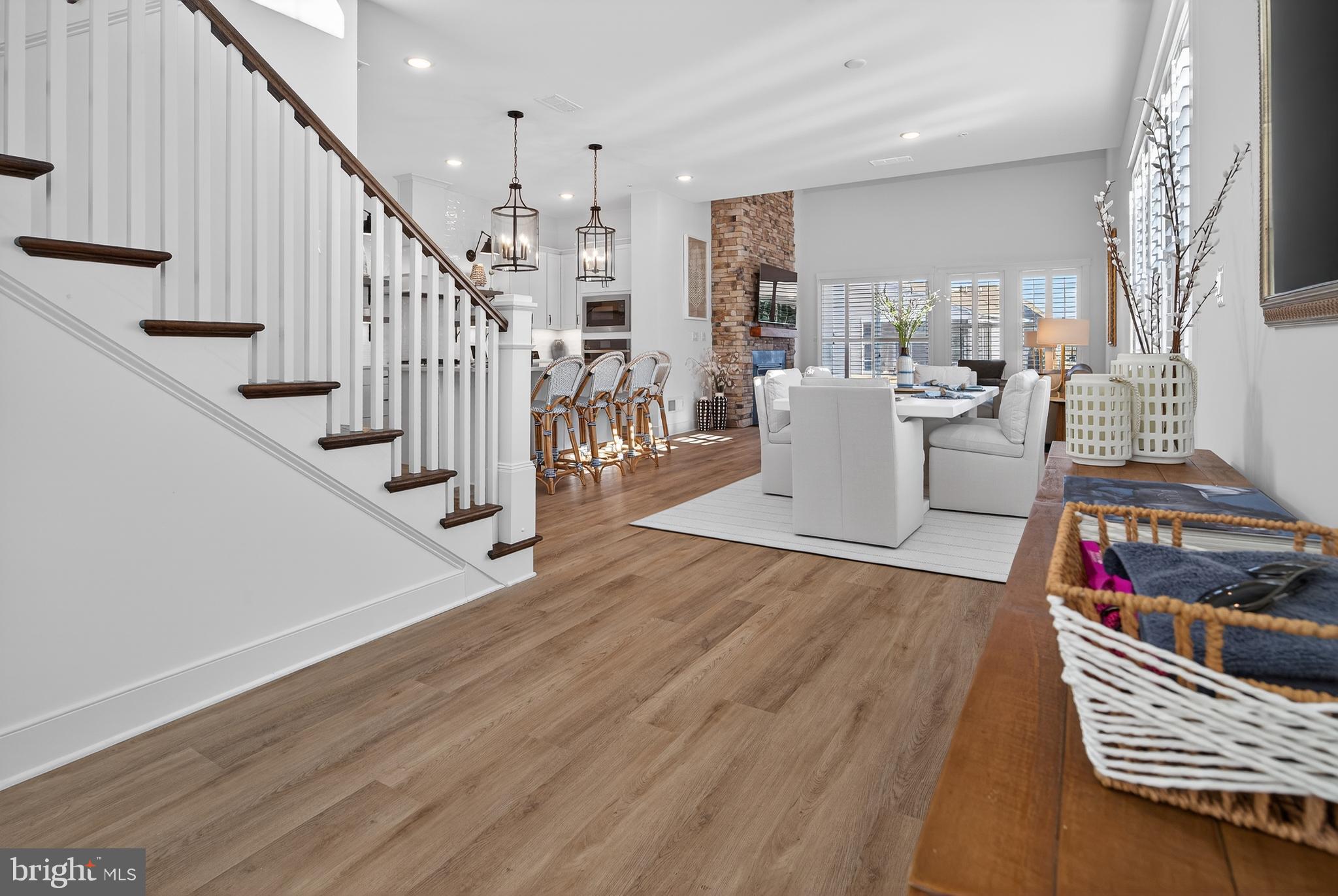 528 Warbler Way Chester, MD 21619 - Photo 4 of 29 a view of kitchen and hall with wooden floor