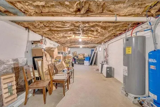 a view of a chairs and table in the balcony