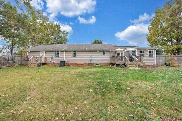 945 Burnt Chimney Road Wirtz, VA 24184 - Photo 39 of 54 a view of a house with a big yard and large trees