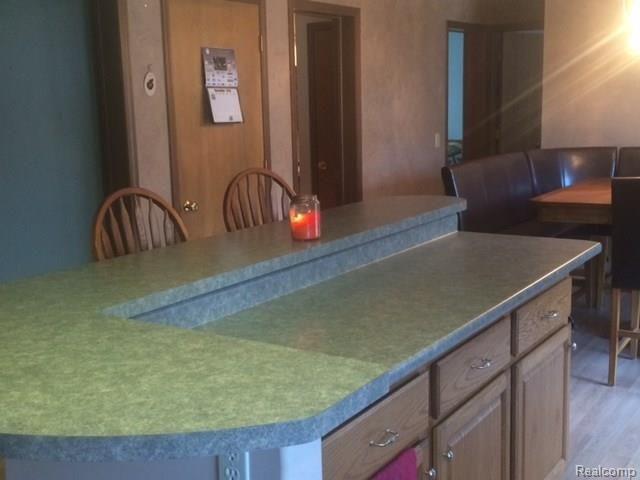 7826 Avoca Road Avoca, MI 48006 - Photo 9 of 23 kitchen island.jpg