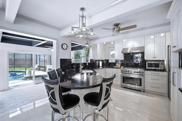 a bedroom with a bed and a table in it