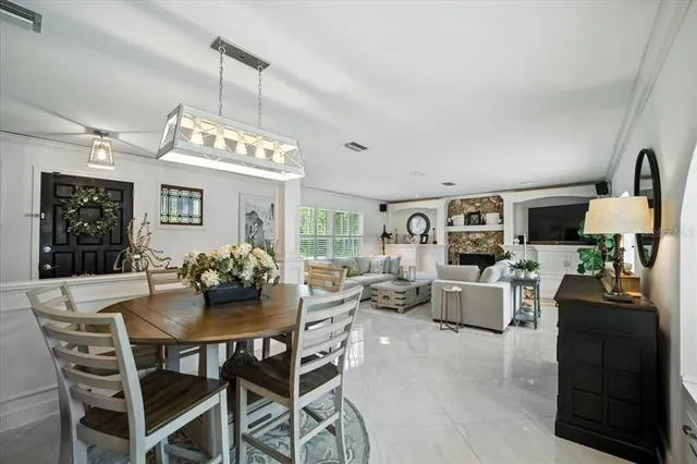 a bedroom with a bed and a mirror