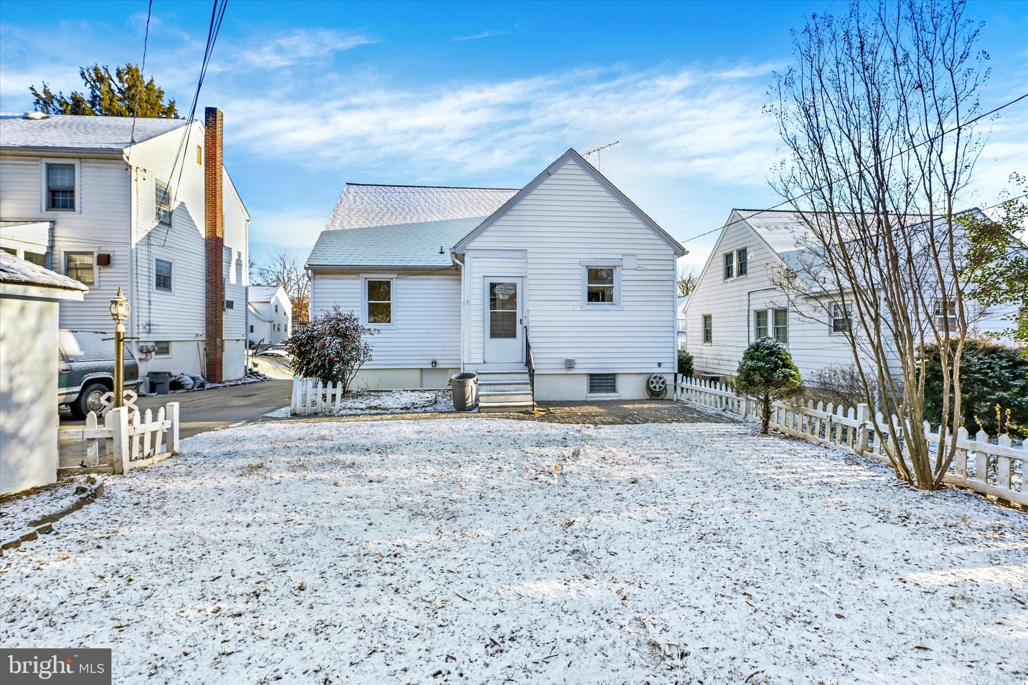 1032 Elm Ridge Avenue Baltimore, MD 21229 - Photo 26 of 28 a view of a house with a yard