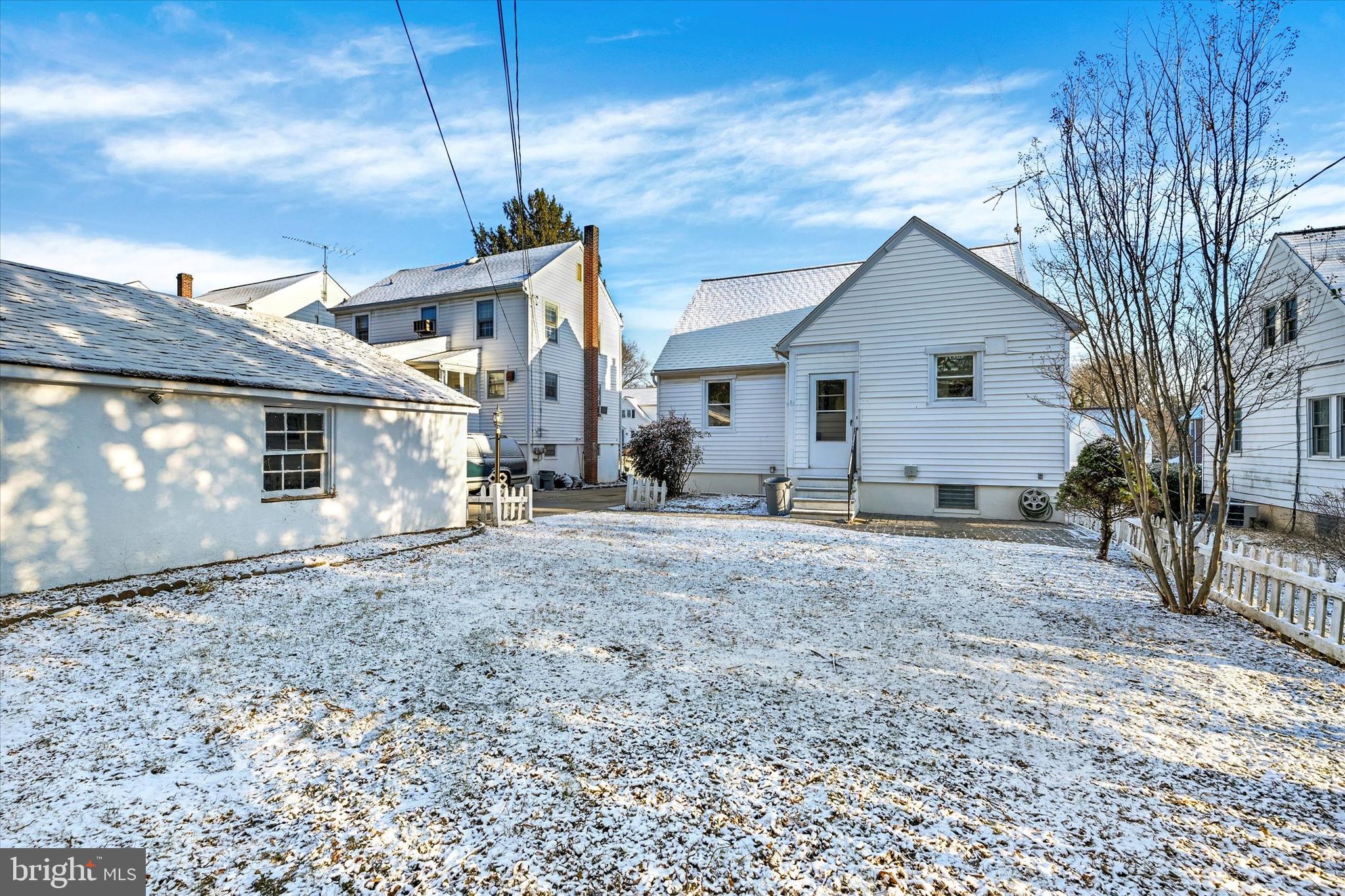 1032 Elm Ridge Avenue Baltimore, MD 21229 - Photo 27 of 28 a view of a house with a yard
