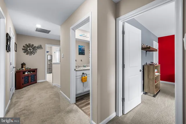 a view of a hallway view with living and furniture