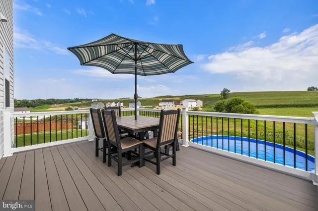 a view of balcony with furniture and outdoor seating