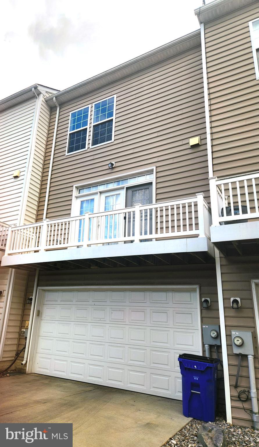 102 Mill Pond Road Frederick, MD 21701 - Photo 2 of 29 a front view of a house with balcony