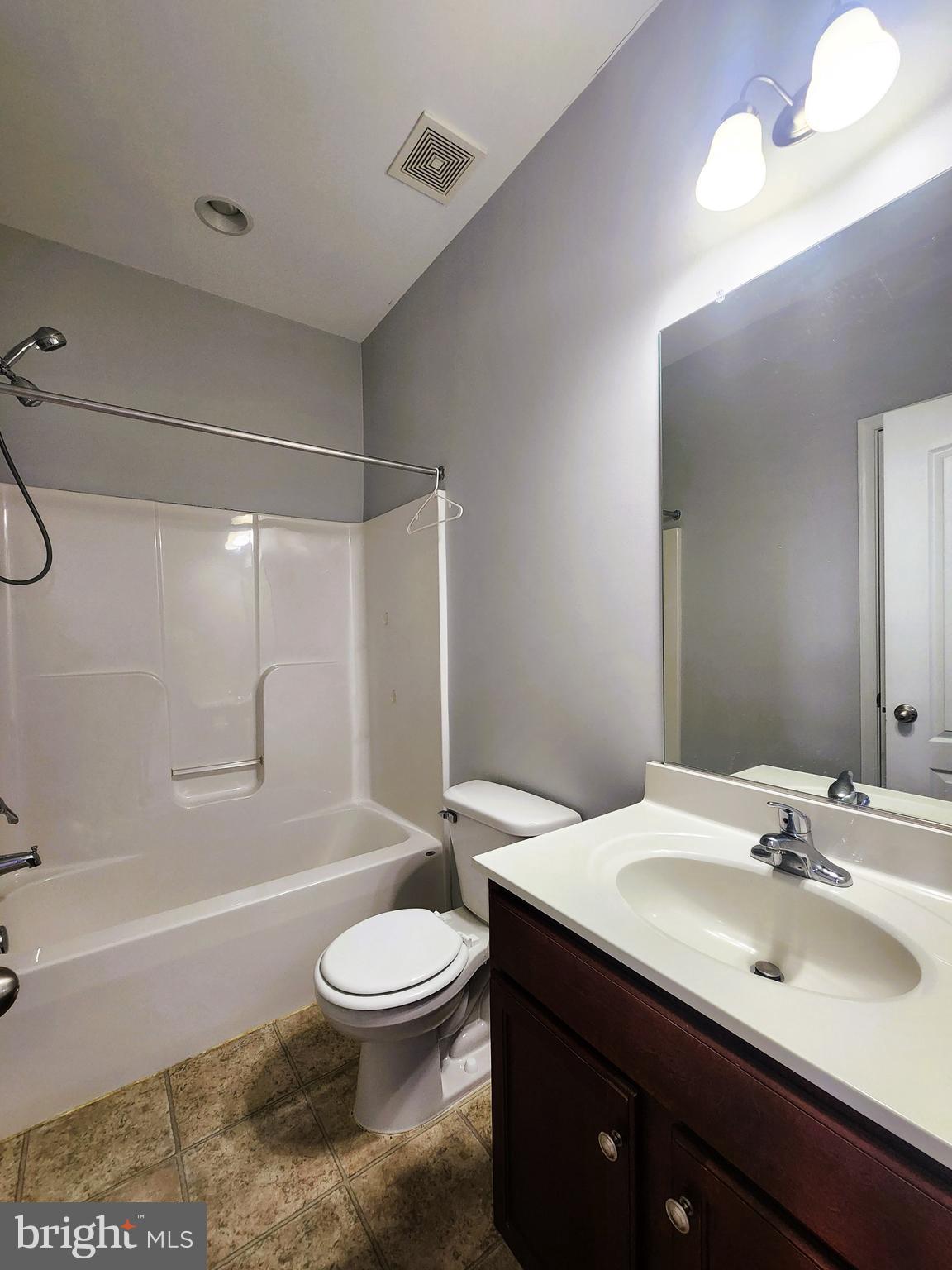 102 Mill Pond Road Frederick, MD 21701 - Photo 21 of 29 a bathroom with a sink a toilet and shower