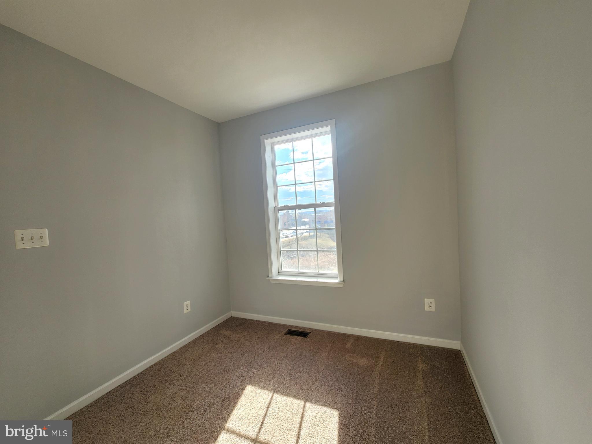 102 Mill Pond Road Frederick, MD 21701 - Photo 24 of 29 an empty room with a window