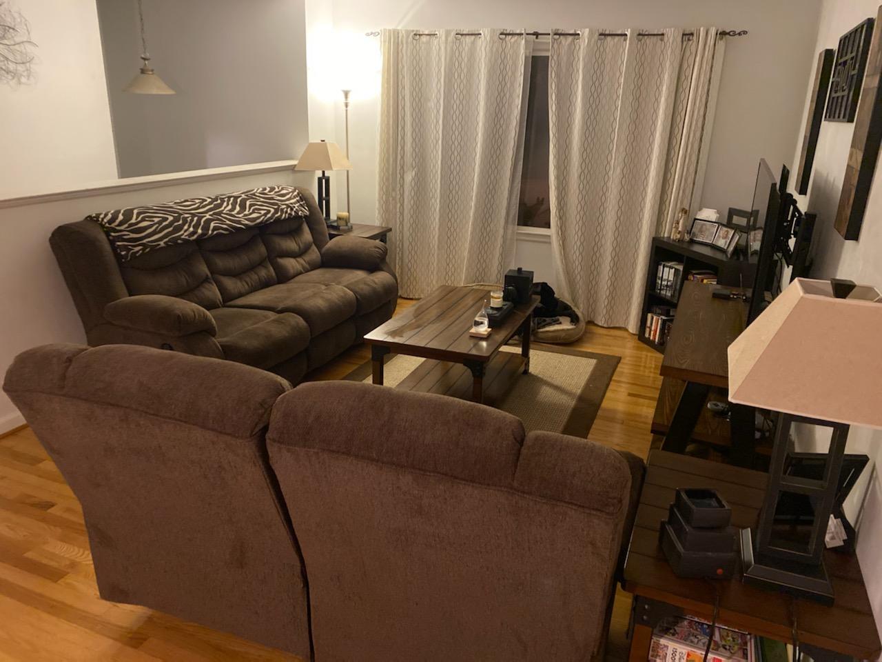 601 Olney Road Vinton, VA 24179 - Photo 2 of 18 a living room with furniture a couch and a flat screen tv