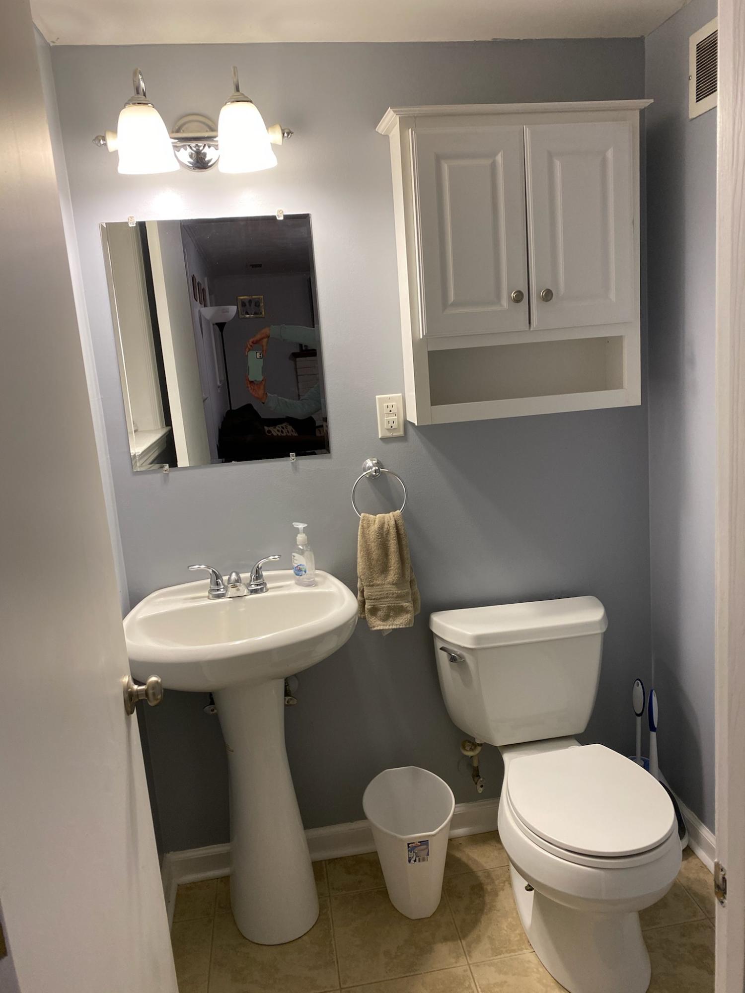 601 Olney Road Vinton, VA 24179 - Photo 15 of 18 a bathroom with a toilet sink and mirror