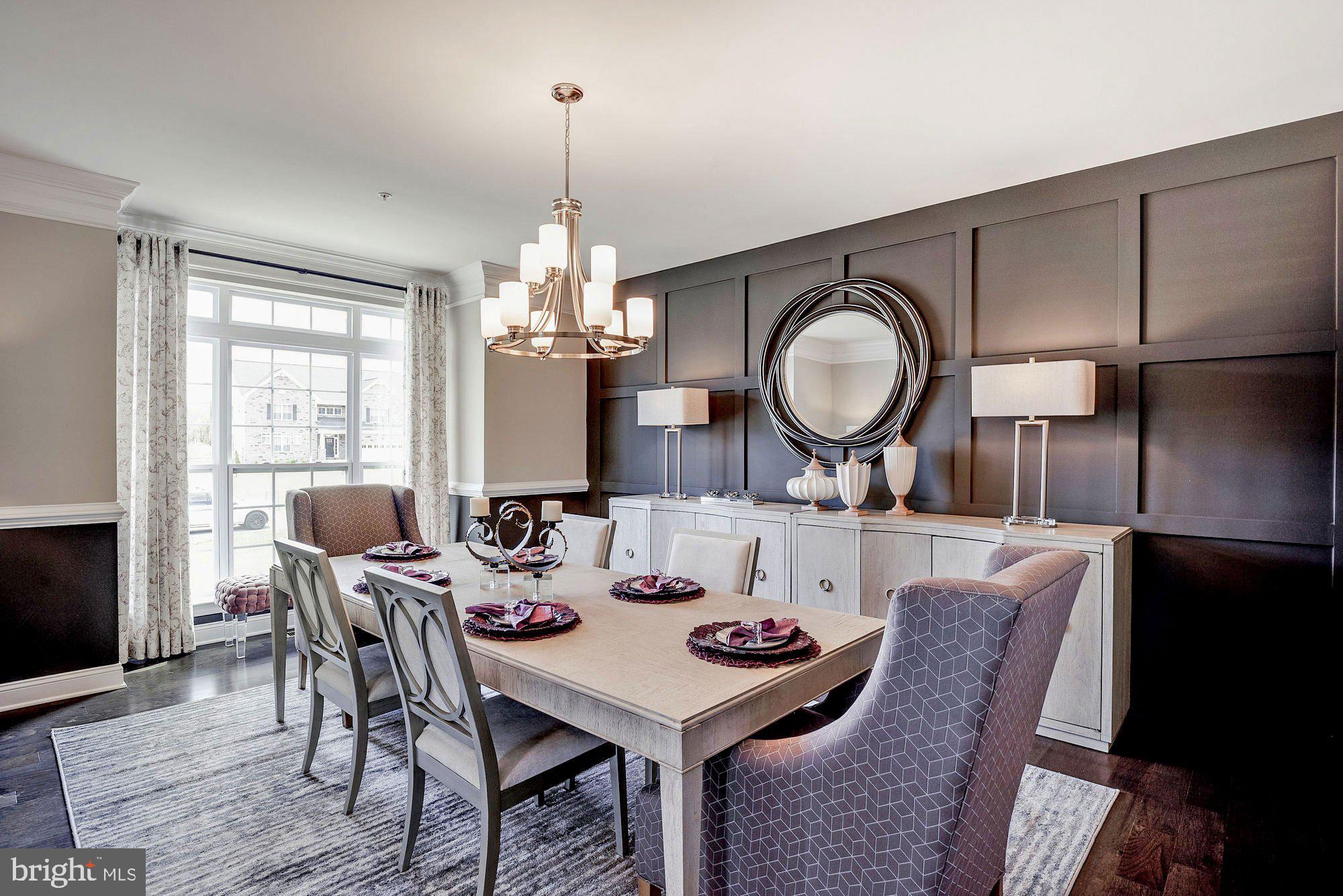 14008 Schaeffer Road Germantown, MD 20874 - Photo 9 of 17 a view of a dining room with furniture and chandelier