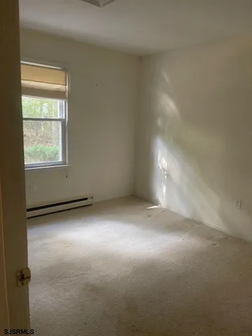 an empty room with a window