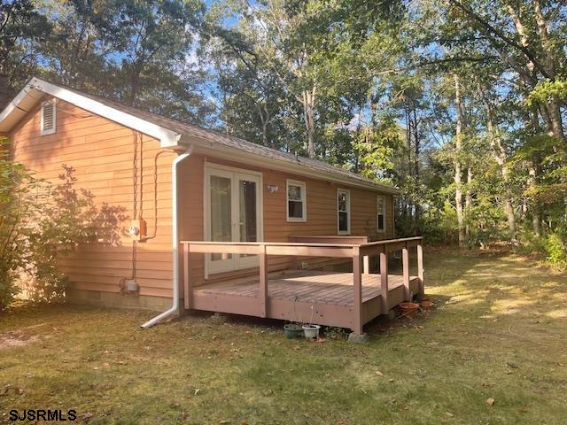 1431 Stagecoach Road Ocean View, NJ 08230 - Photo 10 of 11 a view of a house with a yard